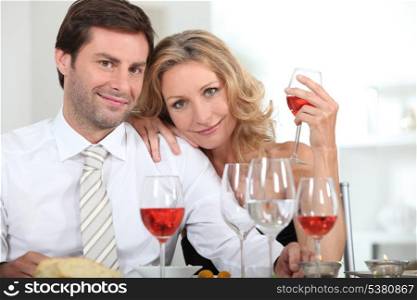 Couple drinking rose