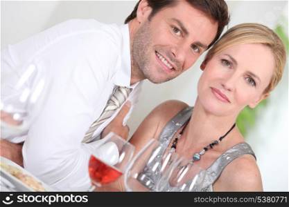 Couple drinking rose wine