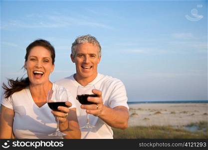 Couple Drinking Wine on Beach