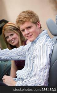 Couple Driving Car