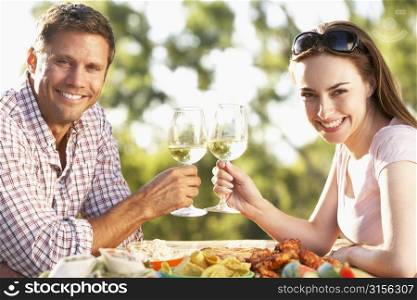 Couple Eating An Al Fresco Meal