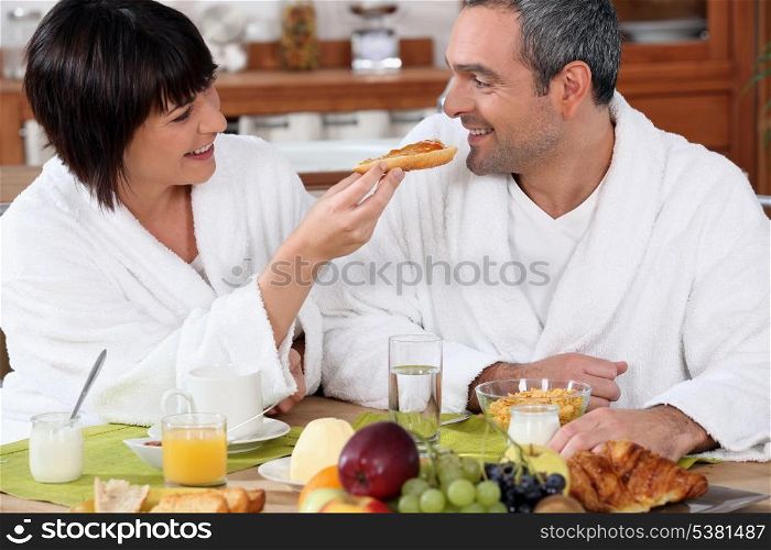 Couple eating breakfast