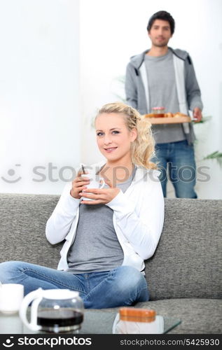 Couple eating breakfast together at home