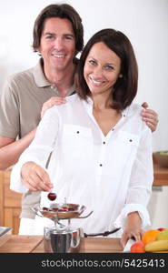 couple eating cherries