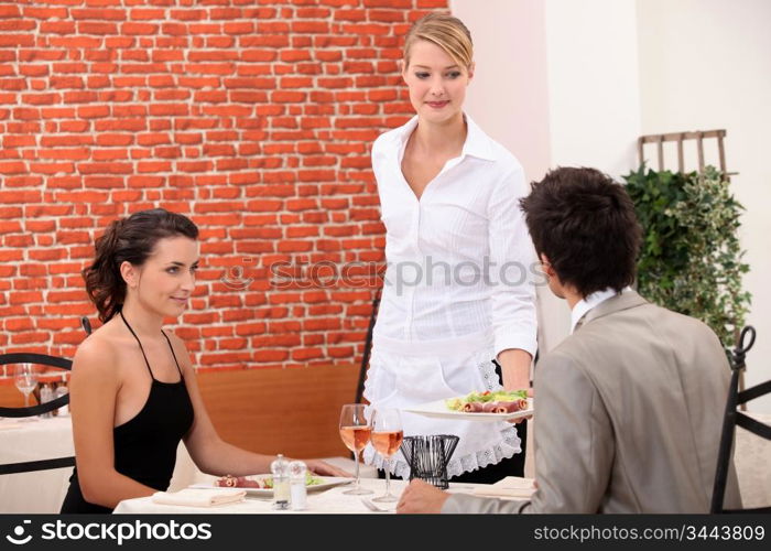 Couple eating in a restaurant