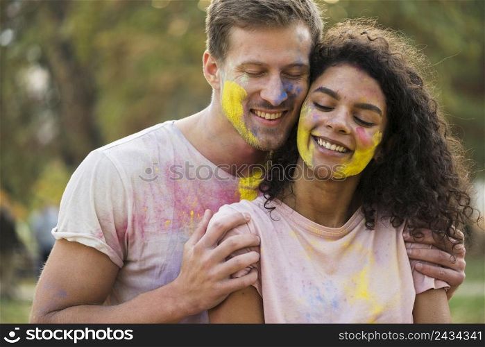 couple embraced holi festival