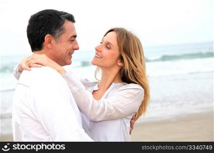 Couple embracing each other at the beach