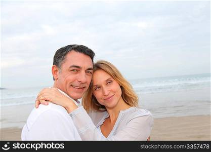 Couple embracing each other at the beach