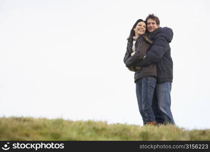 Couple Embracing In Park