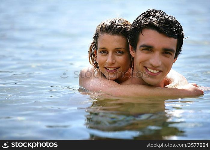 couple embracing in the water