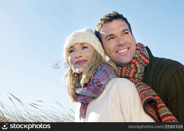 Couple embracing outdoors