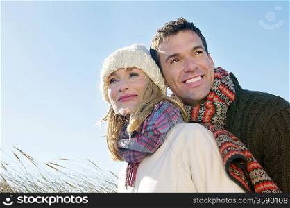 Couple embracing outdoors