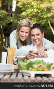 Couple Enjoying a Meal Outdoors