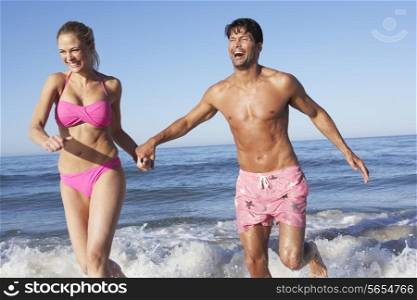 Couple Enjoying Beach Holiday
