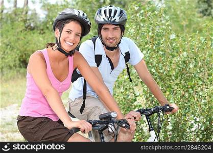 Couple enjoying bike ride