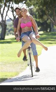 Couple Enjoying Cycle Ride