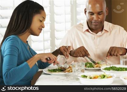Couple Enjoying Meal At Home