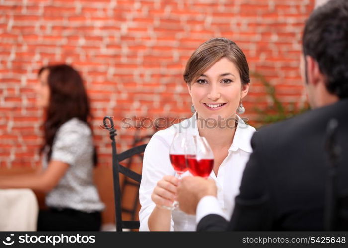 Couple enjoying romantic meal in restaurant