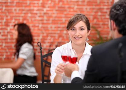 Couple enjoying romantic meal in restaurant