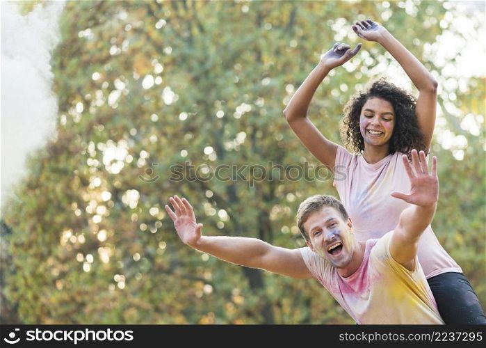 couple feeling while posing holi