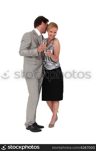 Couple flirting and drinking champagne