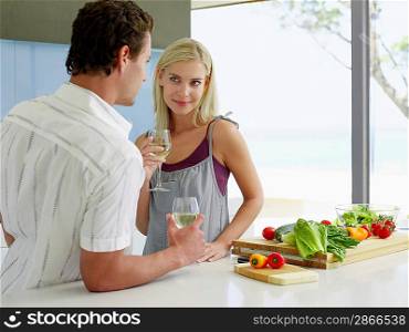 Couple Flirting in Kitchen