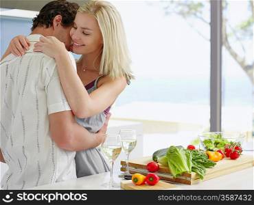Couple Flirting in Kitchen