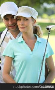 Couple golfing