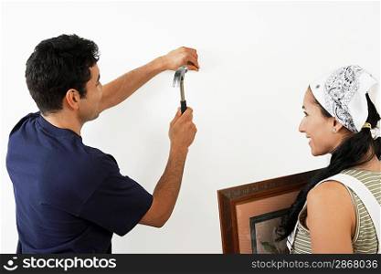 Couple Hanging Picture