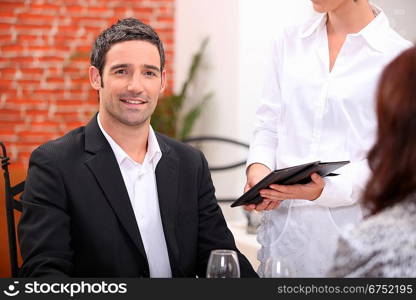 Couple having a meal in a fancy restaurant