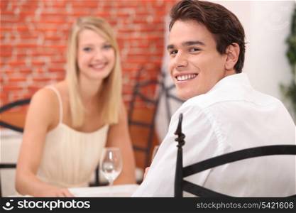 couple having a romantic dinner in a restaurant