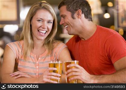 Couple having beer together