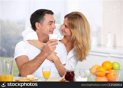 Couple having breakfast during the week end