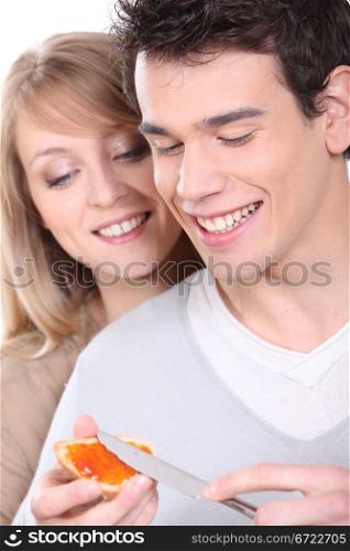 Couple having breakfast together