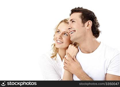Couple having embraced look afar on a white background