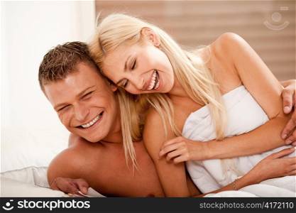 Couple having fun in bed