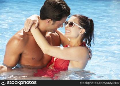 Couple Having Fun In Swimming Pool