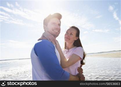 Couple Having Fun On Beach Holiday
