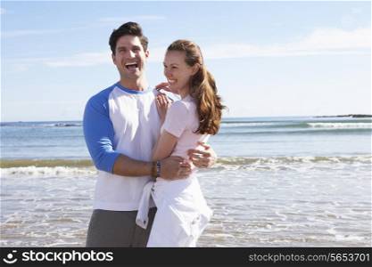 Couple Having Fun On Beach Holiday