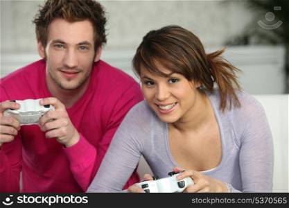 Couple having fun playing video games