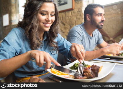 Couple having lunch at rustic gourmet restaurant