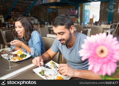 Couple having lunch at rustic gourmet restaurant