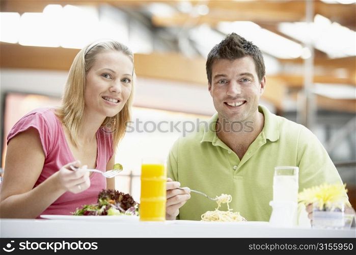 Couple Having Lunch At The Mall