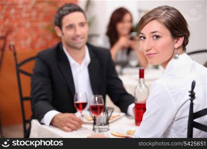 Couple having meal in restaurant