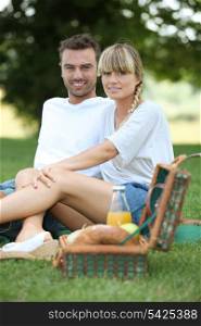 couple having picnic in the park