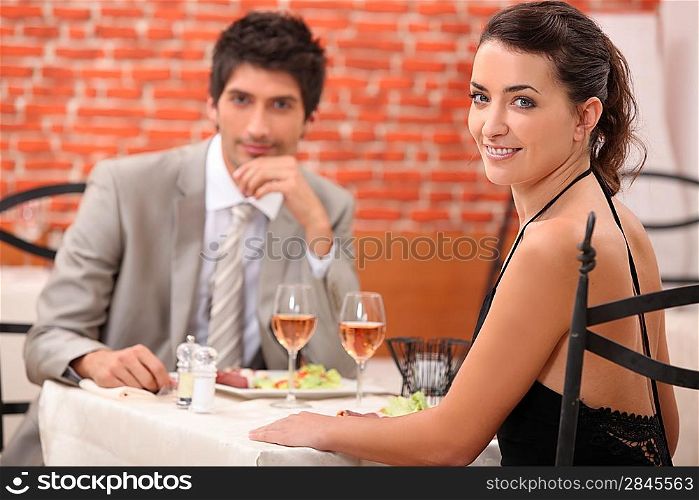 Couple having romantic meal in restaurant