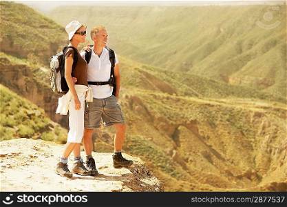 Couple Hiking in Mountain Range