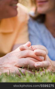 Couple holding hands