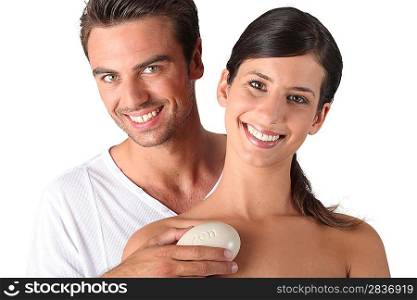Couple holding pebble