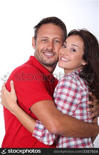 Couple hugging each other tight
